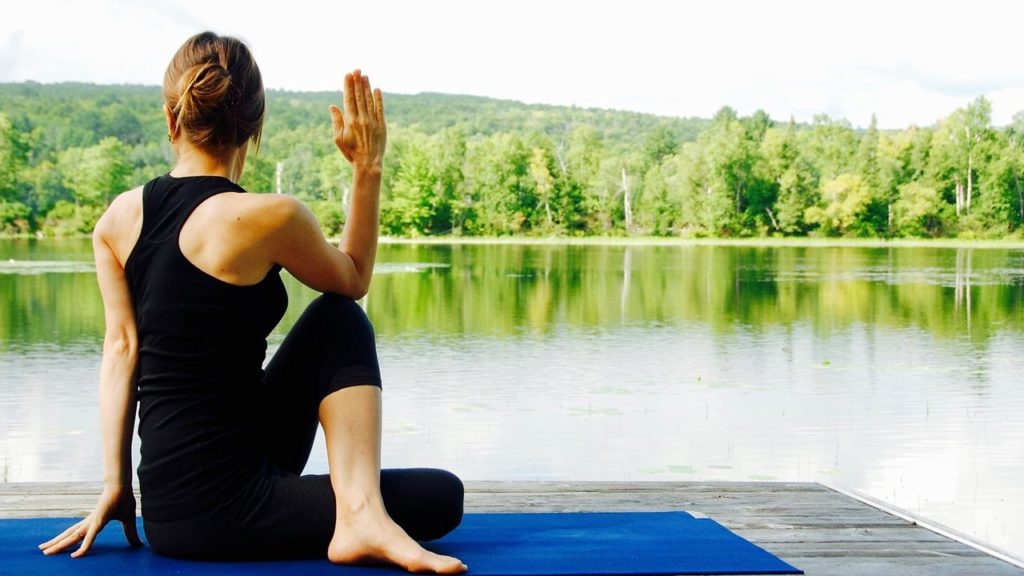 lady yoga by lake