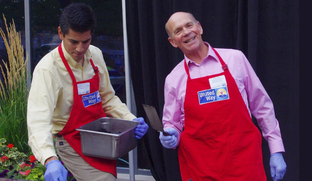 fundraisers in printed aprons