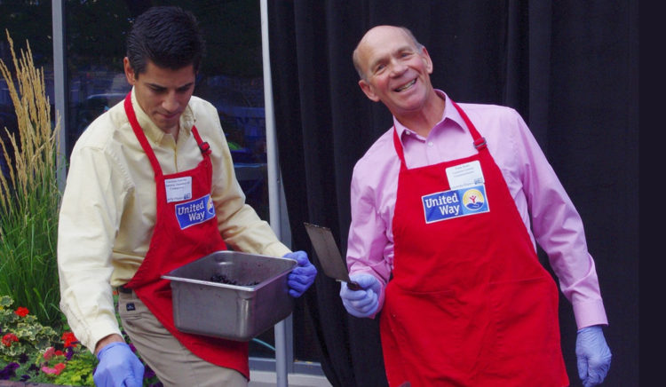 fundraisers in printed aprons
